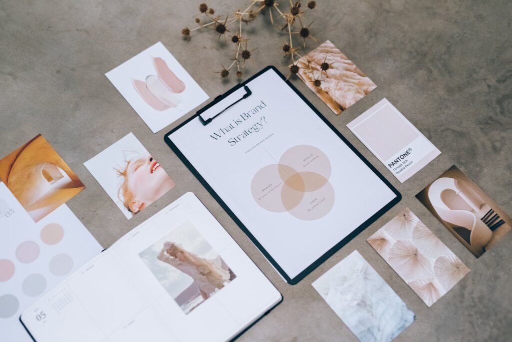 pexels photo 7598017 Flat lay of a minimalist brand strategy moodboard on a concrete surface.